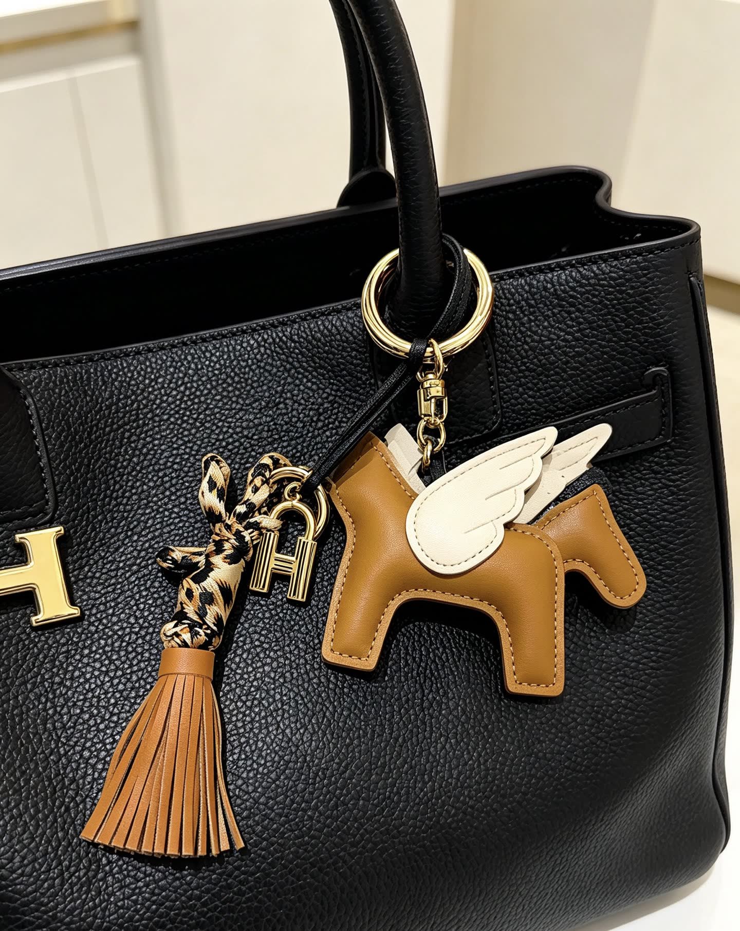 Hermes Hermès Brown Leather Winged Horse Keychain with Tassel