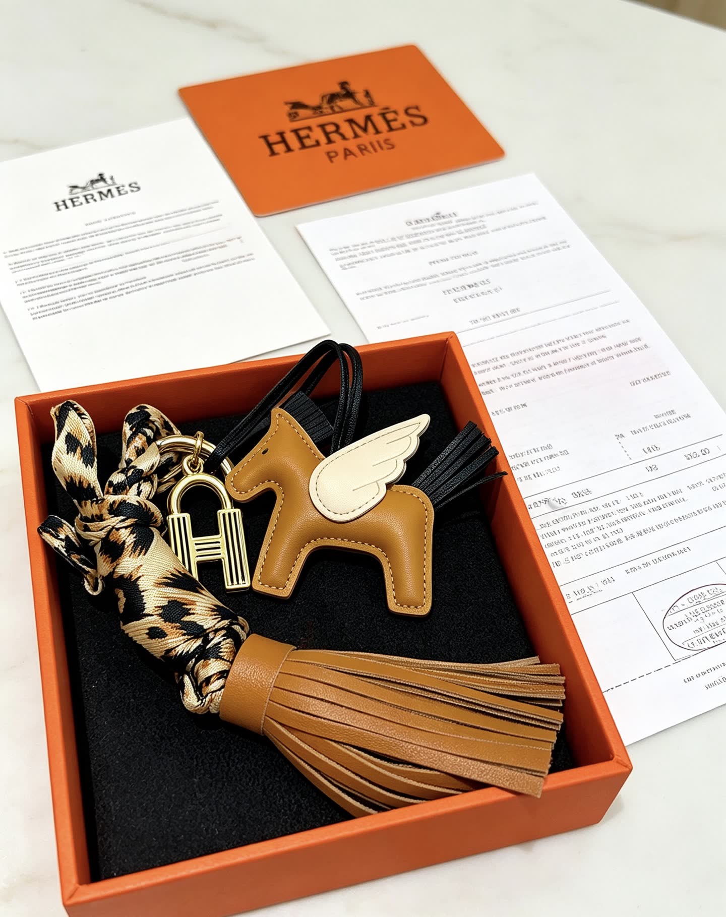Hermes Hermès Brown Leather Winged Horse Keychain with Tassel