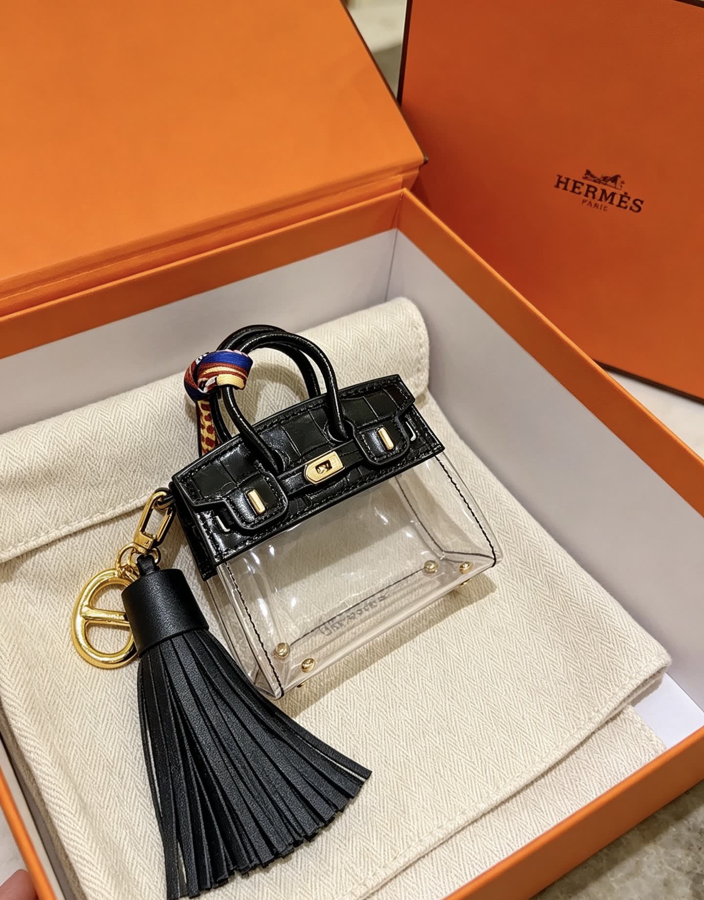 Hermes Hermès Paris Keychain with Transparent Bag and Tassel Hermes Hermès Paris Keychain with Transparent Bag and Tassel