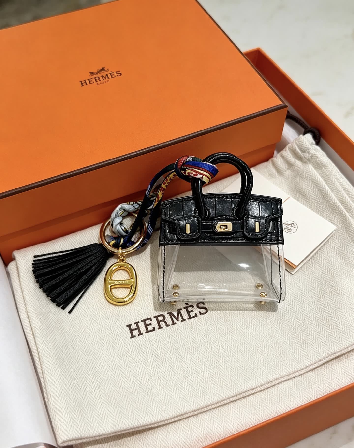Hermes Hermès Paris Keychain with Transparent Bag and Tassel