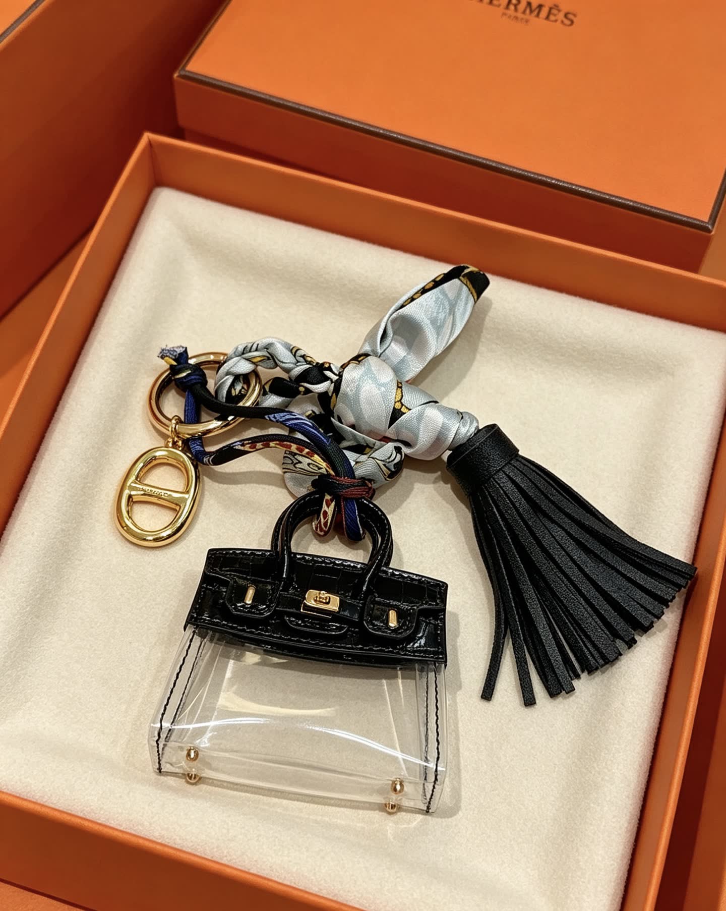 Hermes Hermès Paris Keychain with Transparent Bag and Tassel