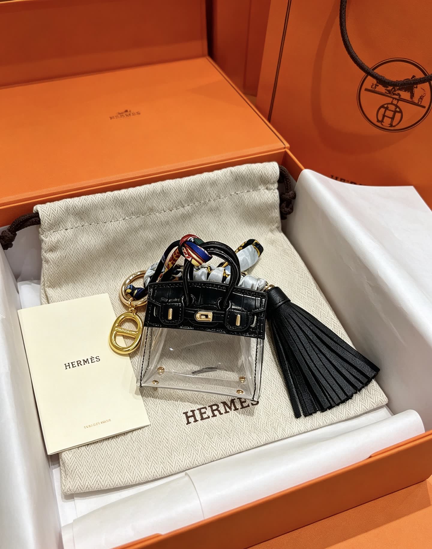 Hermes Hermès Paris Keychain with Transparent Bag and Tassel