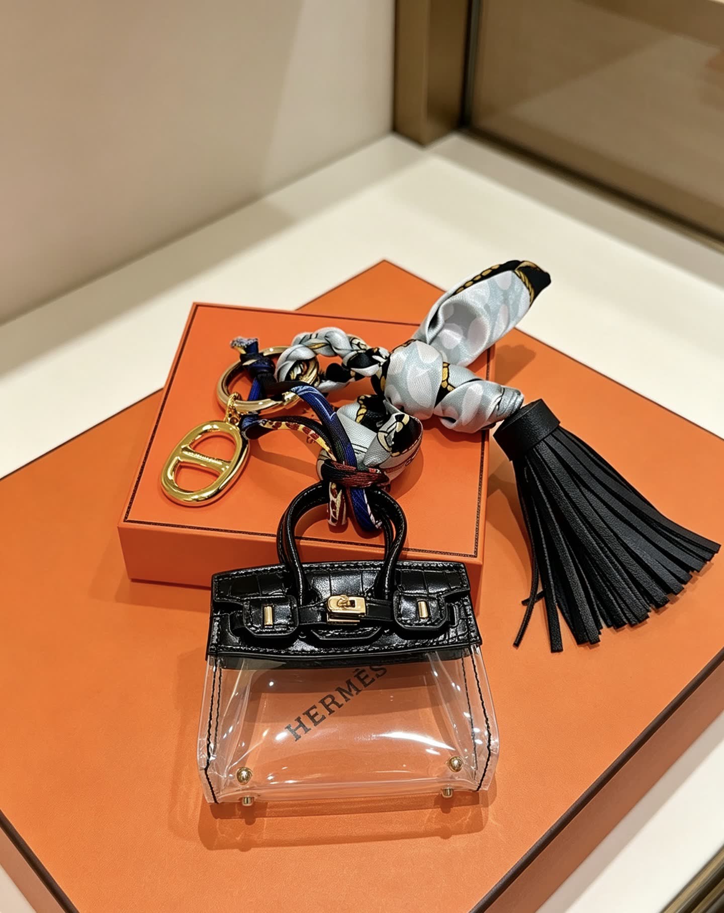 Hermes Hermès Paris Keychain with Transparent Bag and Tassel
