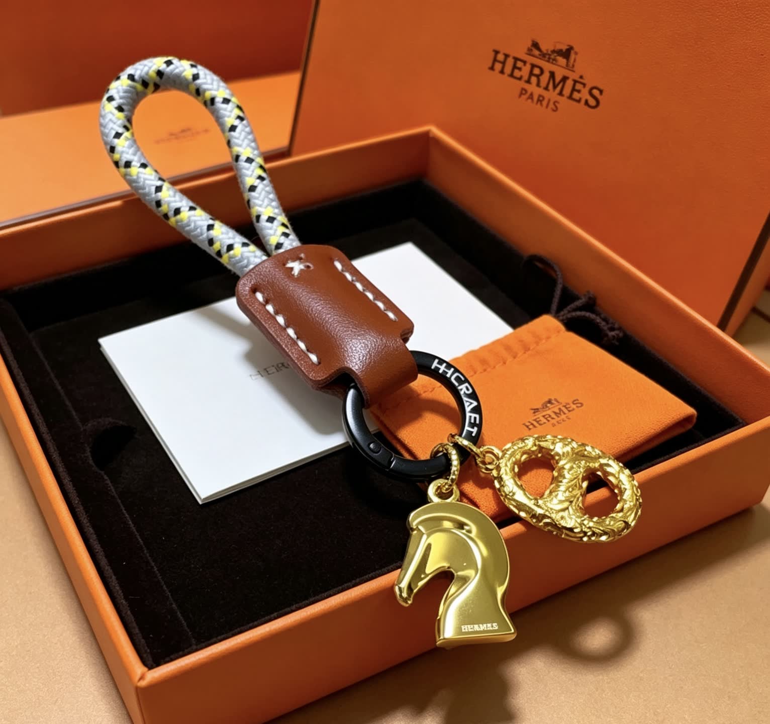Hermes Hermès Kelly Bag Charm with Gold Horse and intertwined H