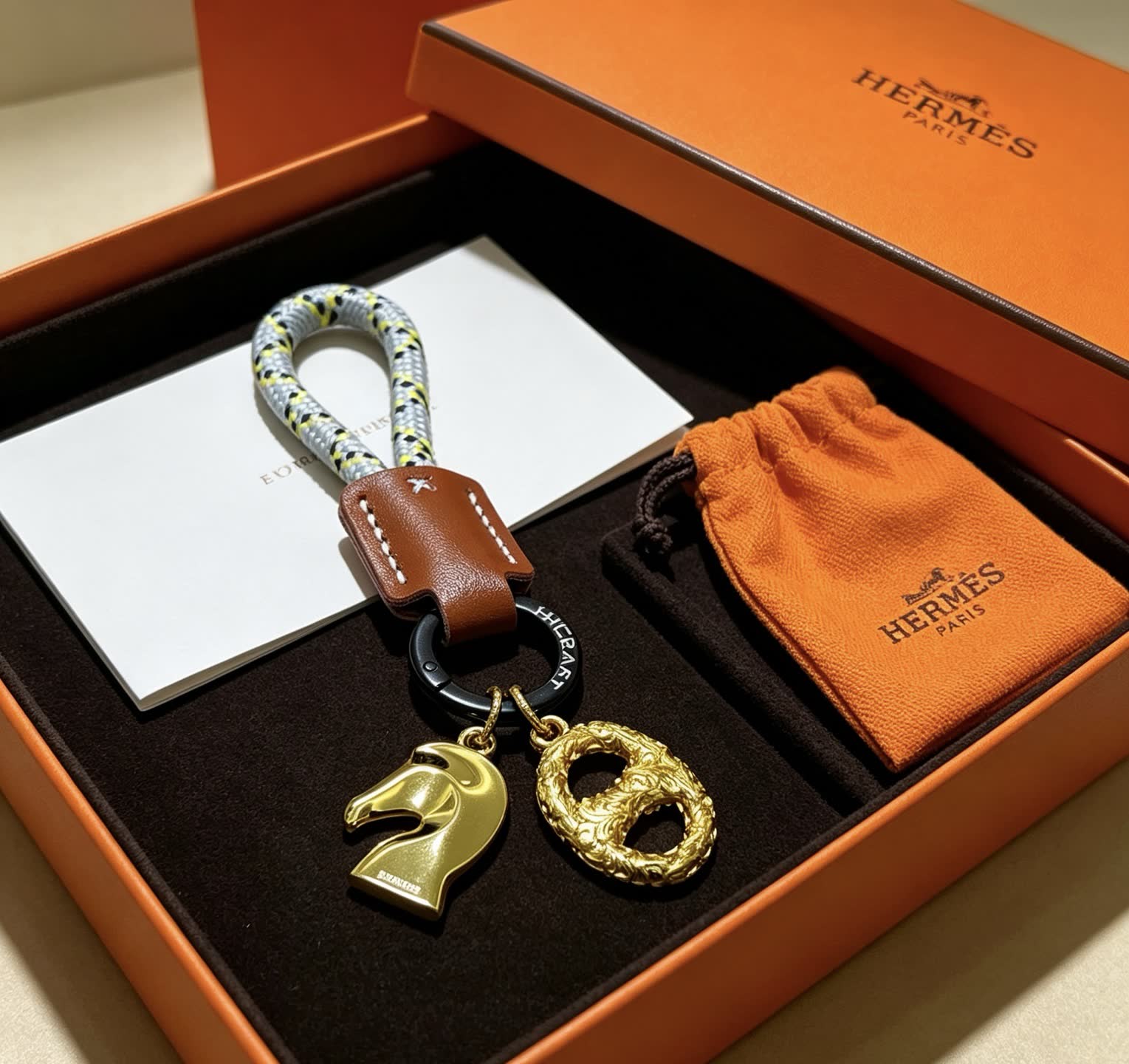 Hermes Hermès Kelly Bag Charm with Gold Horse and intertwined H