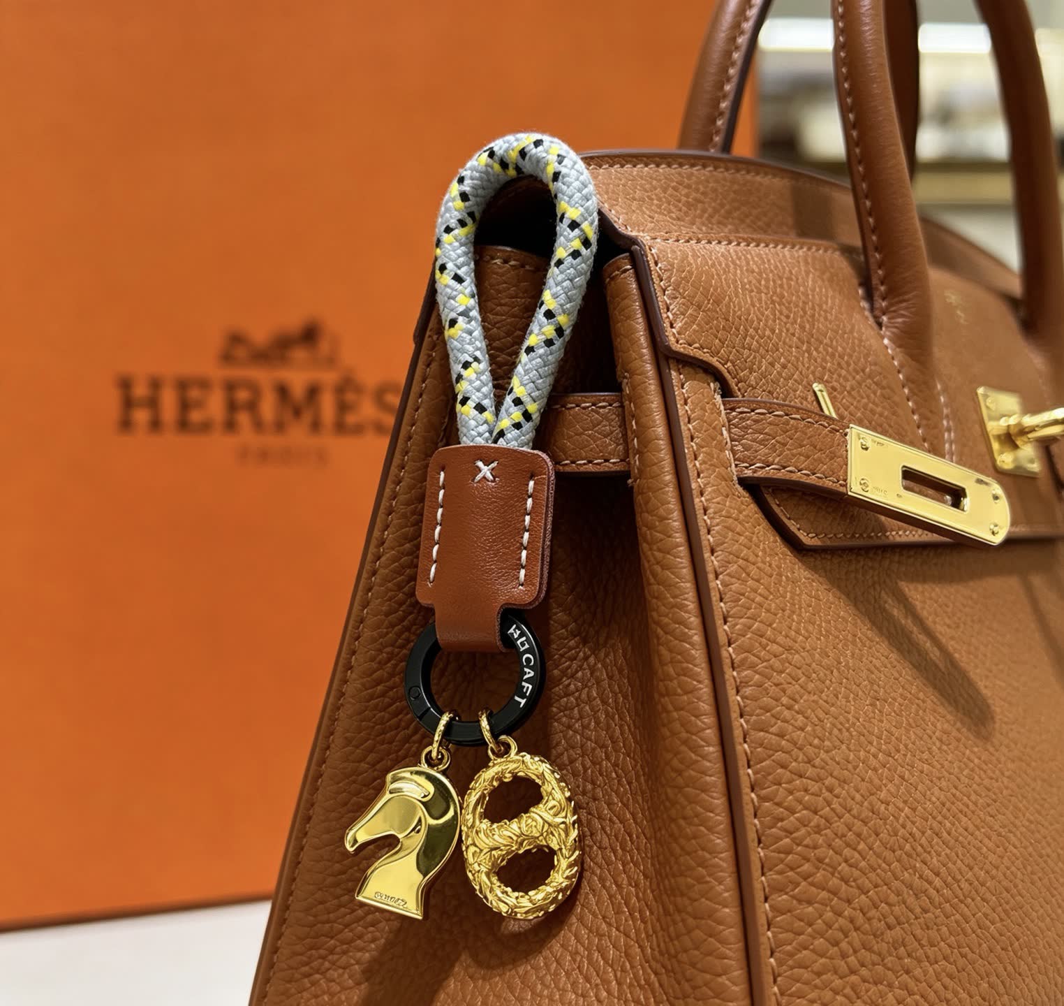 Hermes Hermès Kelly Bag Charm with Gold Horse and intertwined H