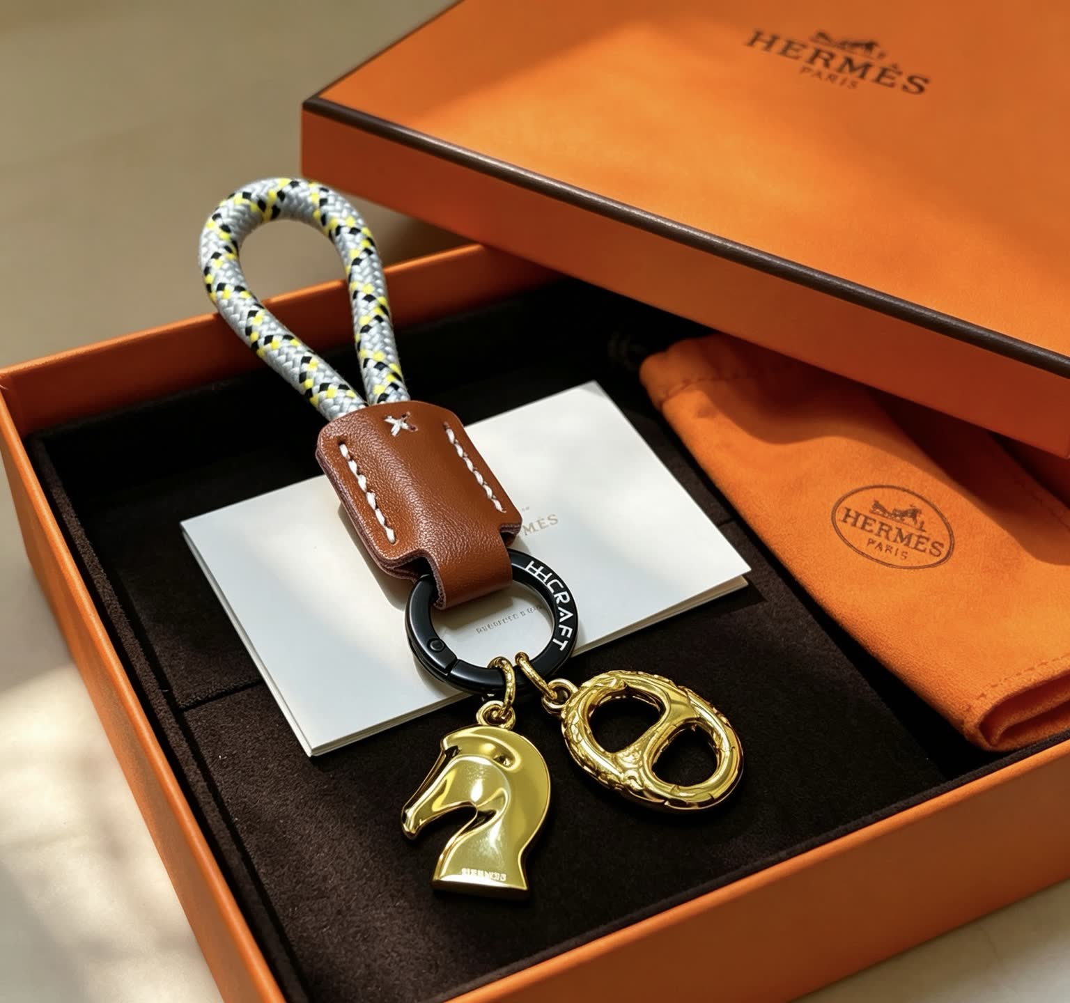 Hermes Hermès Kelly Bag Charm with Gold Horse and intertwined H