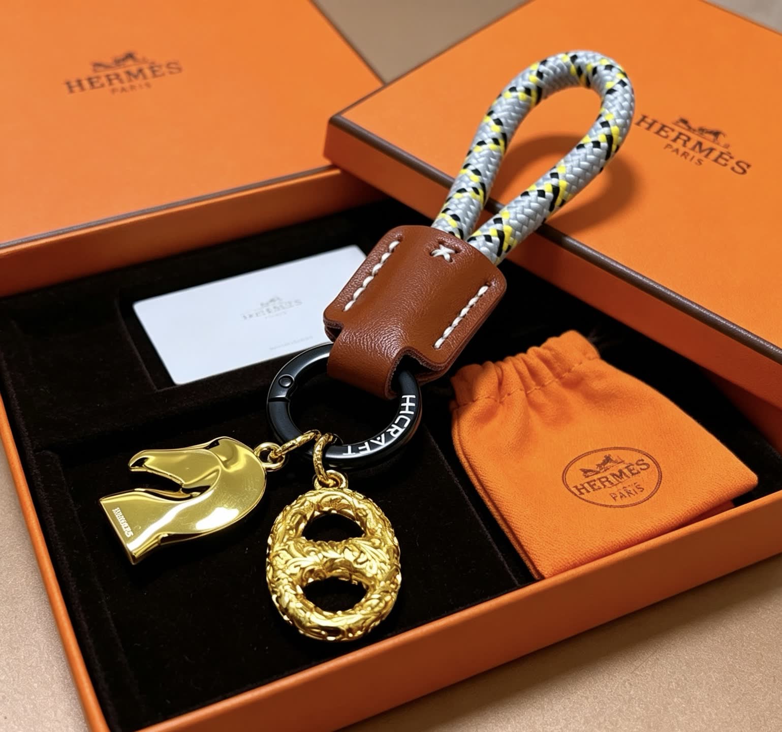 Hermes Hermès Kelly Bag Charm with Gold Horse and intertwined H