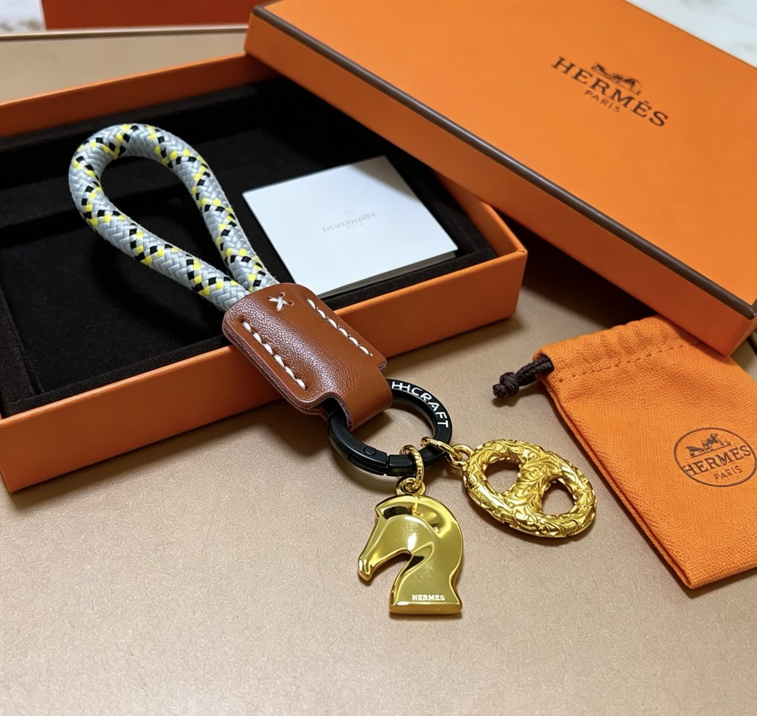 Hermes Hermès Kelly Bag Charm with Gold Horse and intertwined H