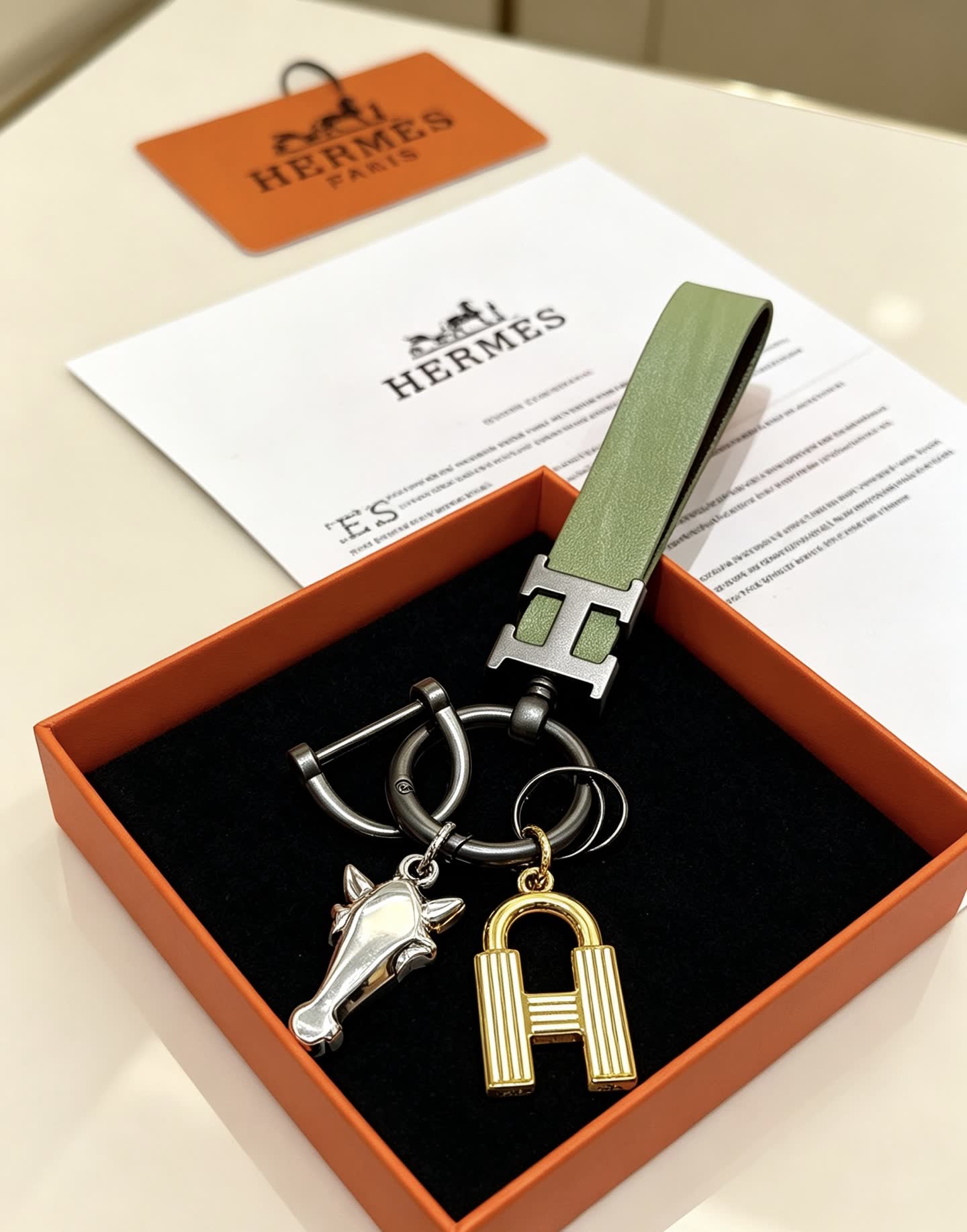 Hermes Hermès Paris Keychain with Leather Strap and Metal Charms Hermes Hermès Paris Keychain with Leather Strap and Metal Charms