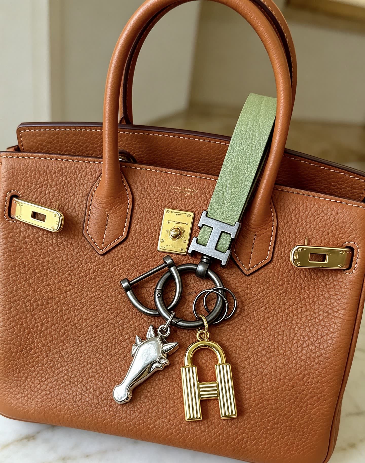 Hermes Hermès Paris Keychain with Leather Strap and Metal Charms