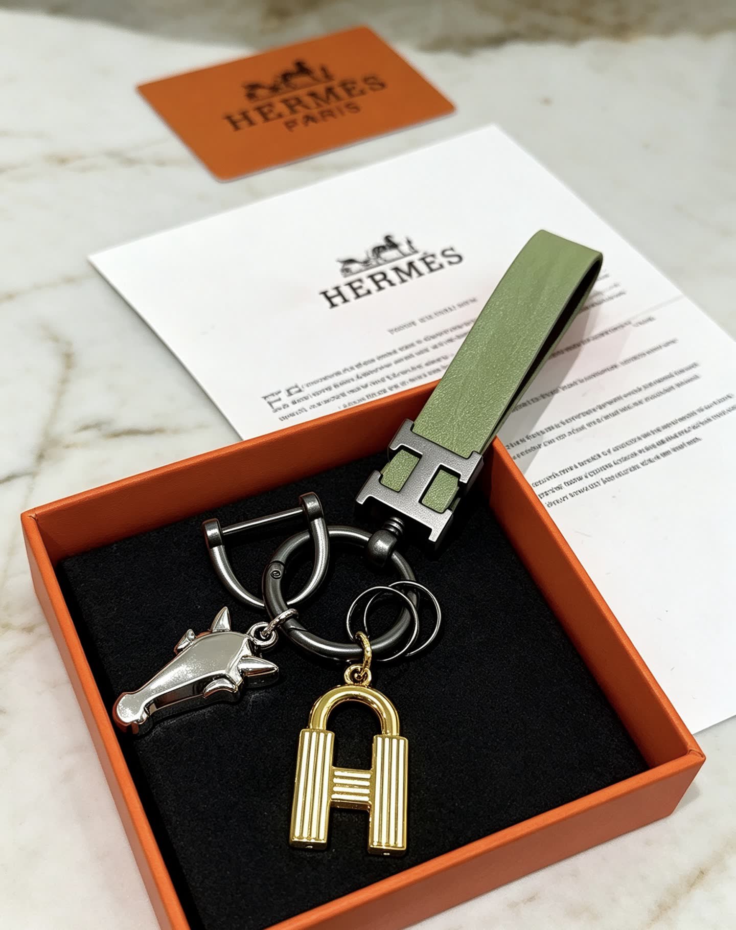 Hermes Hermès Paris Keychain with Leather Strap and Metal Charms