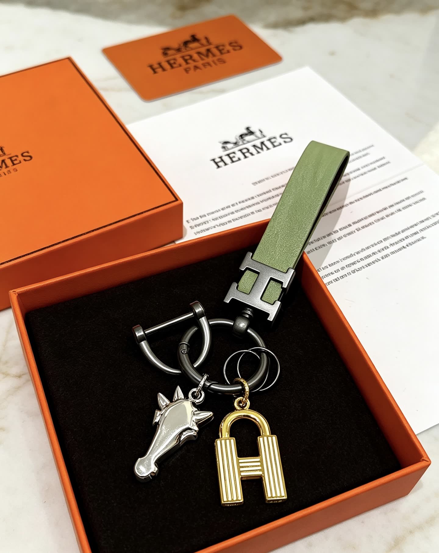 Hermes Hermès Paris Keychain with Leather Strap and Metal Charms