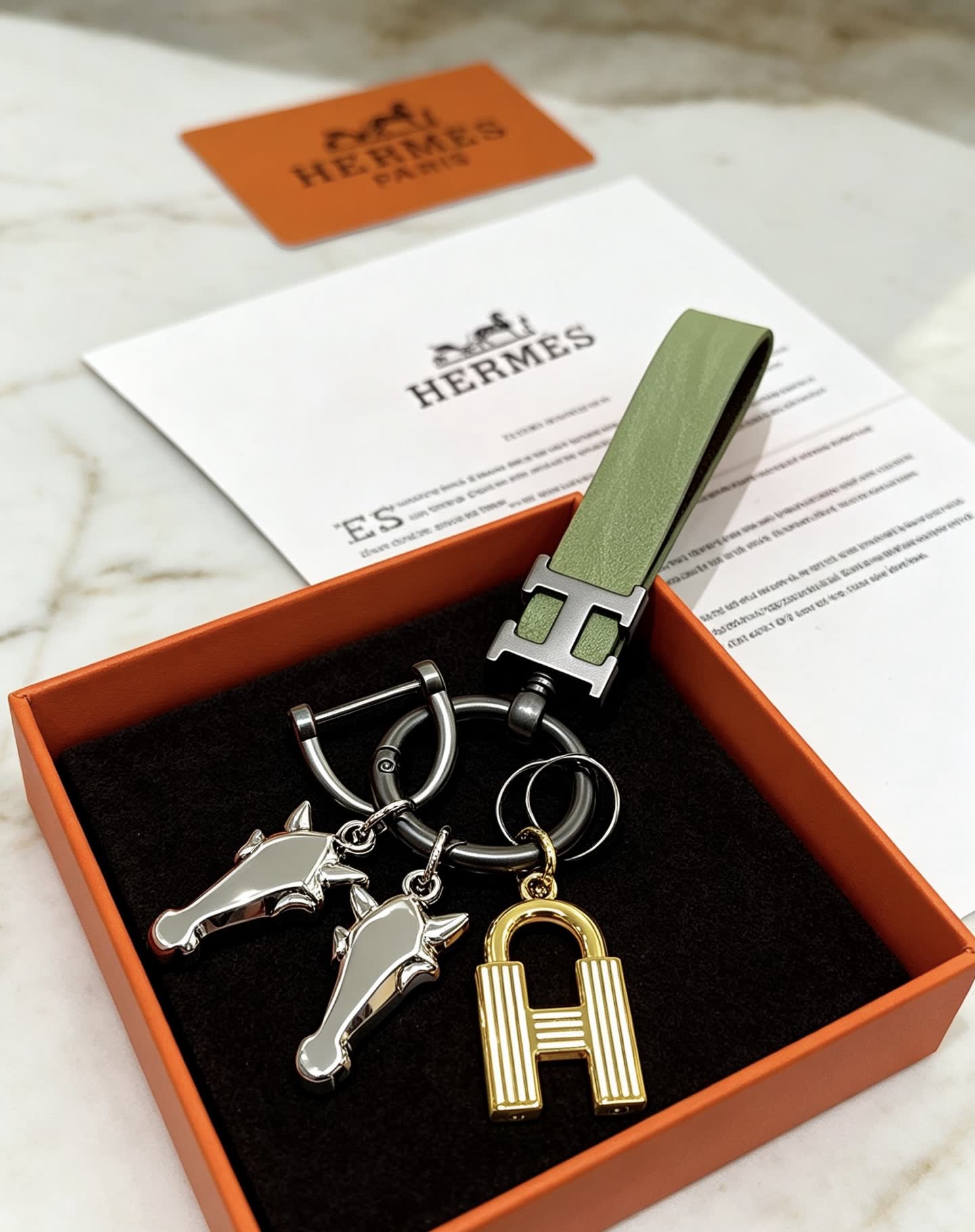 Hermes Hermès Paris Keychain with Leather Strap and Metal Charms