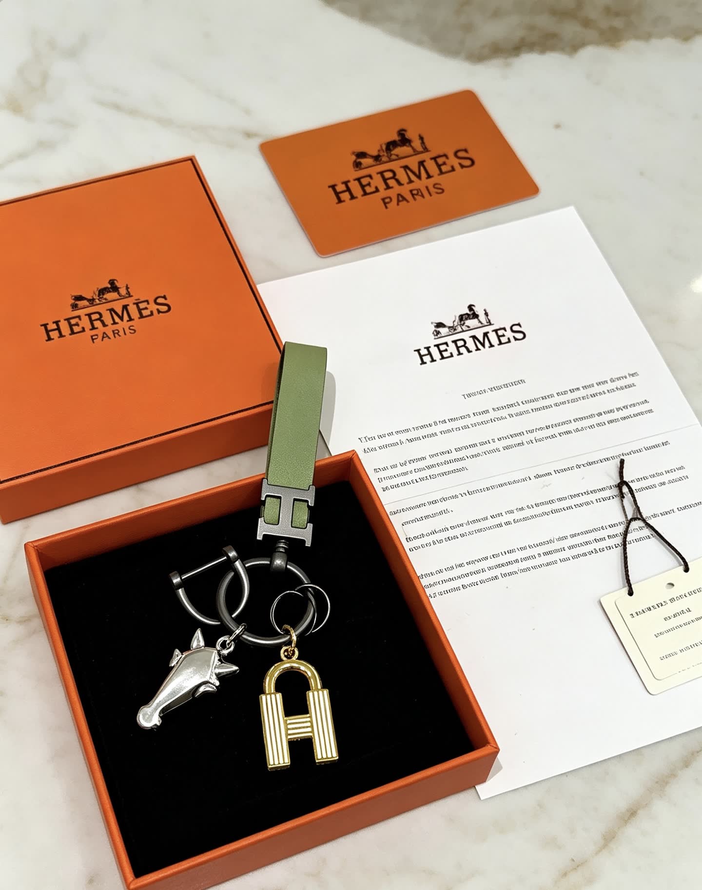 Hermes Hermès Paris Keychain with Leather Strap and Metal Charms