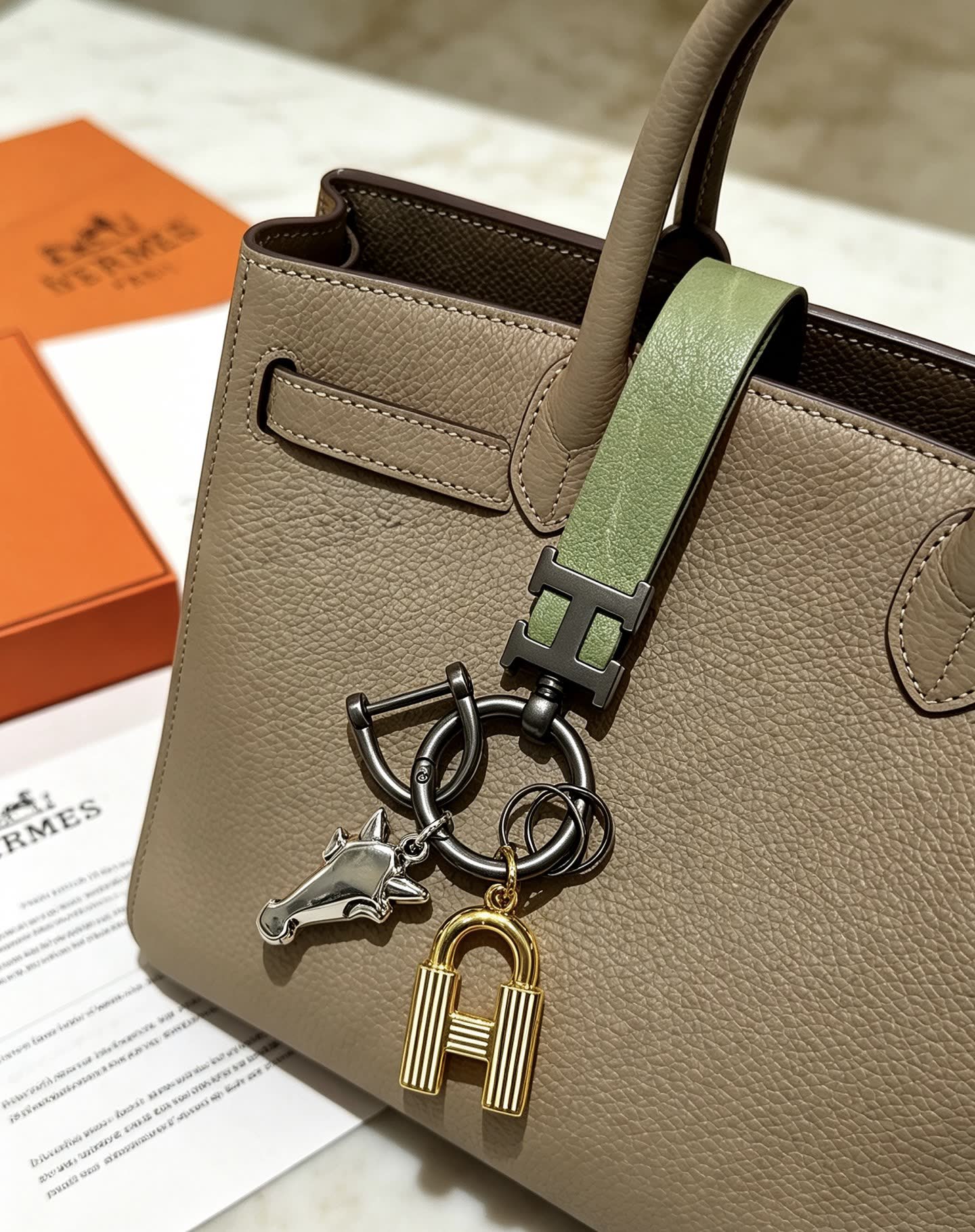 Hermes Hermès Paris Keychain with Leather Strap and Metal Charms