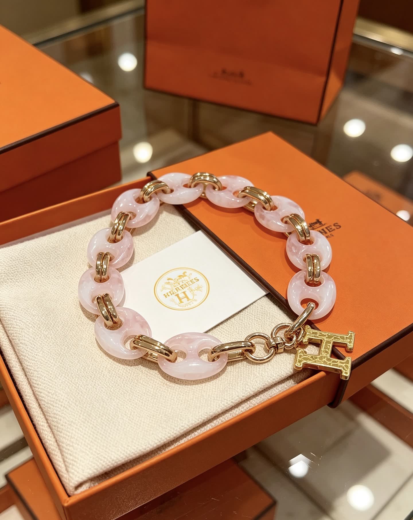 Hermès Keychain, Pink and Gold Chain Design