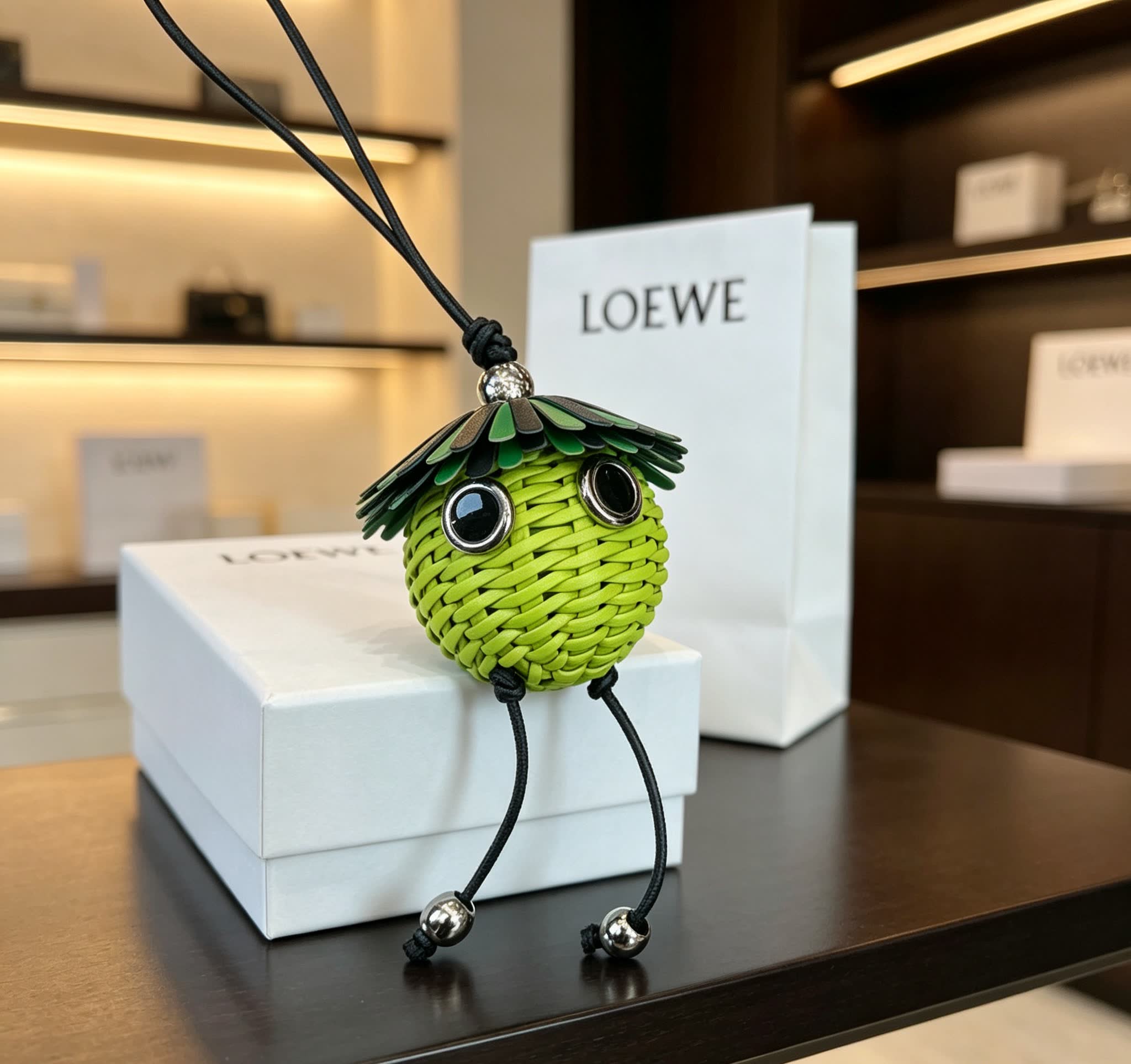 LOEWE Green Wicker Keychain with Silver Accents
