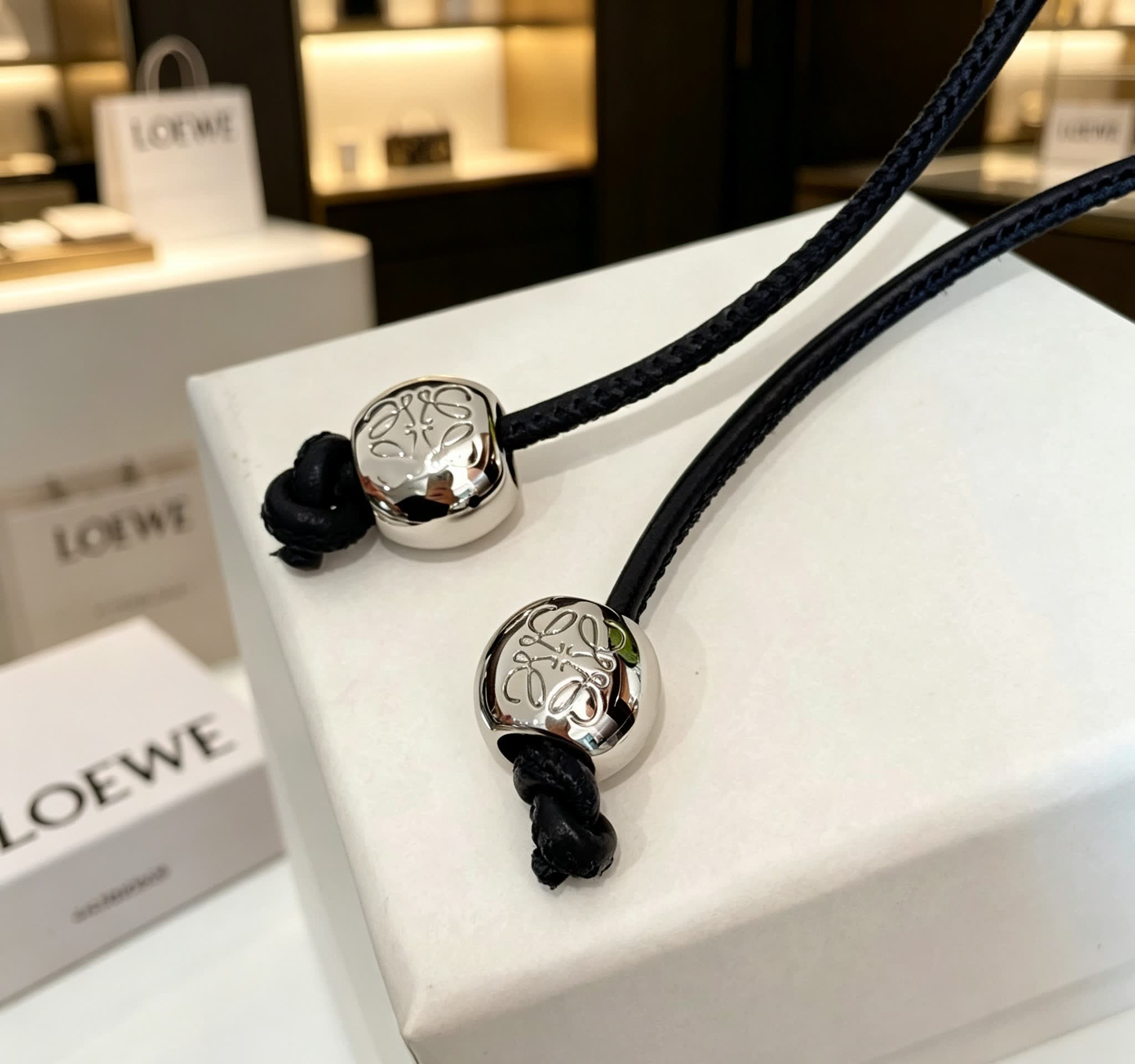 LOEWE Green Wicker Keychain with Silver Accents